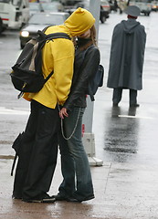 Image showing Kissing couple after the rain