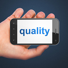 Image showing Marketing concept: Quality on smartphone