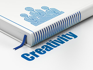 Image showing Advertising concept: book Business Team, Creativity on white background