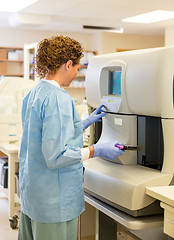 Image showing Female Lab Tech with Hematology Test Specimens