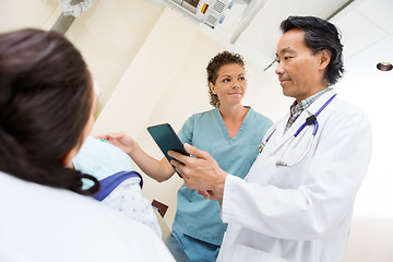 Image showing Medical Team And Patient In Hospital Room