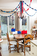 Image showing Birthday Presents On Dining Table