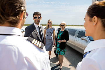 Image showing Business Professionals Greeting Pilot And Airhostess At Airport