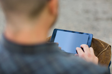 Image showing University Student Touching Digital Tablet