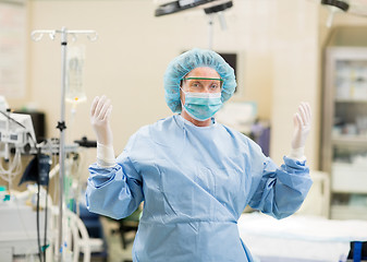 Image showing Mature Doctor In Surgical Gown