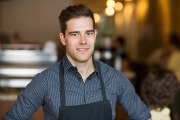 Image showing Smiling Male Owner In Cafe