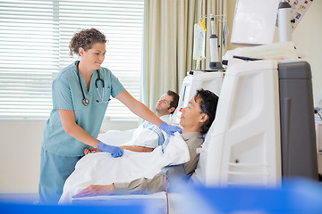 Image showing Nurse Assisting Patient Undergoing Renal Dialysis