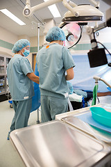 Image showing Female Nurses Preparing Patient Before Operation