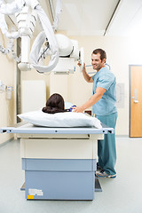 Image showing Nurse Adjusting Xray Machine For Patient