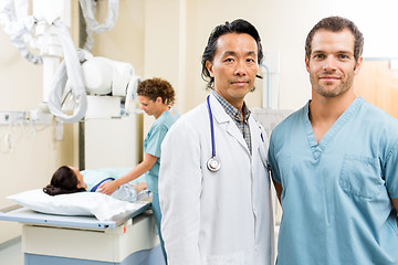 Image showing Medical Team With Patient In Examination Room