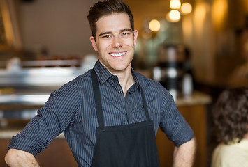 Image showing Happy Male Owner In Cafe