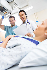 Image showing Medical Team With Patient In Examination Room