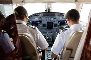 Image showing Pilot And Copilot In Cockpit