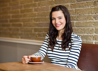 Image showing Attractive Woman in Cafe with Coffee