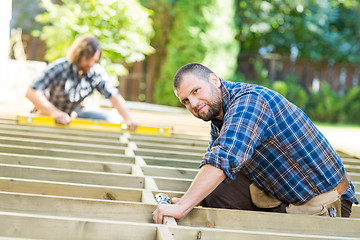 Image showing Carpenter Working At Construction Site