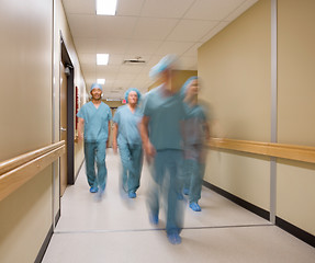 Image showing Medical Team Walking In Hospital Corridor
