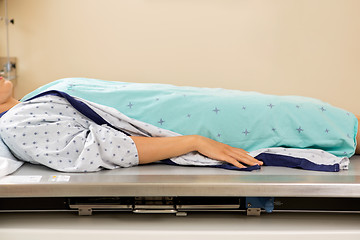 Image showing Patient Lying On Xray Table