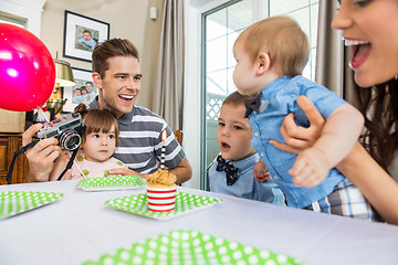 Image showing Family Celebrating Son's Birthday