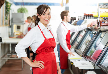 Image showing Confident Butcher Standing At Store