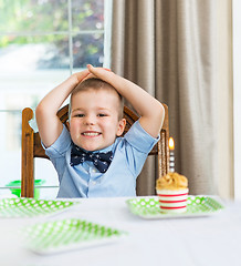 Image showing Mother With Boy Celebrating Birthday At Home