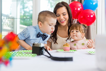 Image showing Family Celebrating Boy's Birthday