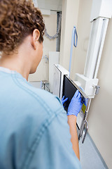 Image showing Nurse Adjusting Xray Film In Machine