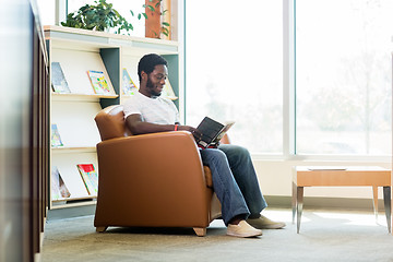 Image showing Student Reading Book In Bookstore