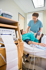 Image showing Nurse Examining Pregnant Woman