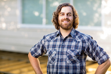 Image showing Confident Carpenter Standing At Construction Site