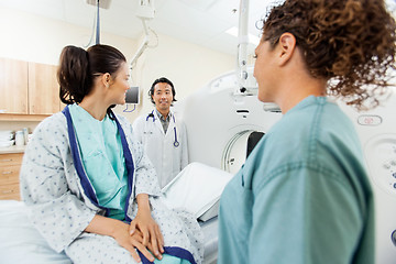 Image showing Patient With Medical Team In CT Scan Room