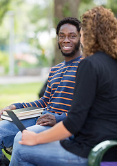 Image showing Students Sitting On University On Campus