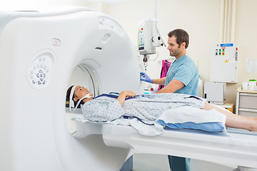 Image showing Nurse Preparing Patient For CT Scan In Hospital