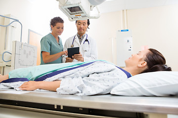 Image showing Medical Team With Patient In Hospital Room