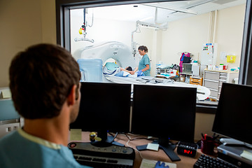 Image showing Radiologist Working In CT Scan Lab