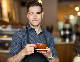 Image showing Barista with Coffee Cup