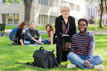 Image showing Professor Helping Student on Digital Tablet