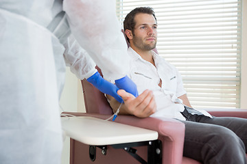 Image showing Patient Receiving Intravenous Treatment In Chemo Room