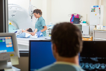 Image showing Nurse Preparing Patient For CT Scan