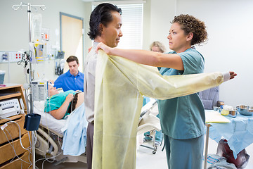 Image showing Doctor Preparing to Deliver Baby in Hospital