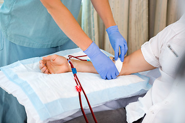 Image showing Nurse Starting Dialysis on Patient