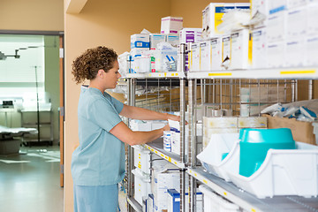 Image showing Nurse Working In Storage Room Of Hospital