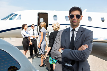 Image showing Confident Young Businessman At Airport Terminal