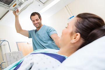 Image showing Nurse Adjusting Xray Machine For Patient