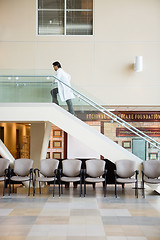 Image showing Doctor Climbing Up Stairs In Hospital