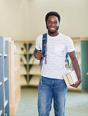 Image showing Student With Backpack And Books In Library