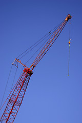 Image showing Construction crane against blue sky