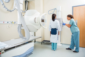 Image showing Nurse Adjusting Xray Machine For Patient