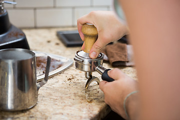 Image showing Barista Tamping Espresso