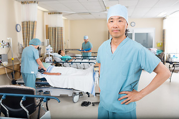 Image showing Nurse Colleagues Examining Patient's In Ward