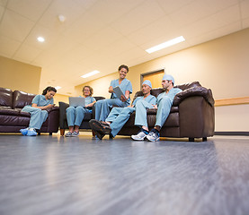 Image showing Medical Team Using Technologies In Hospital's Waiting Room